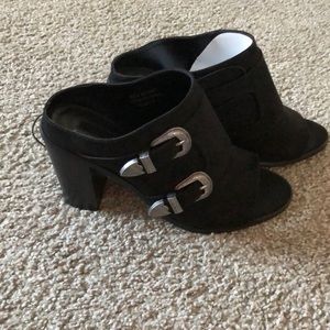 Black buckled peep toe mules